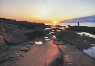 Aperçu contenu Québec L'Essentiel - Coucher de soleil sur la plage
